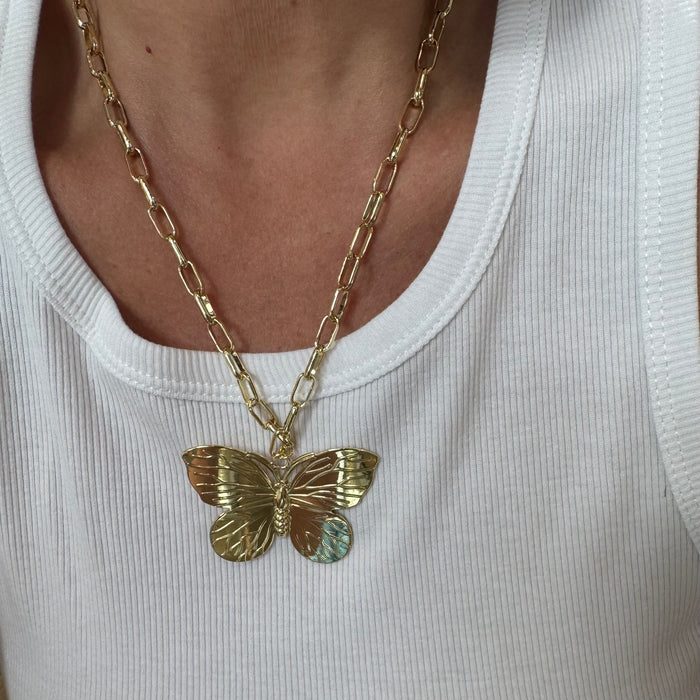 Dainty gold layered necklace with a gold butterfly pendant, wholesale jewelry for women's boutiques, statement accessory, waterproof necklaces, boutique wholesale jewelry, trendy, hypoallergenic, tarnish free