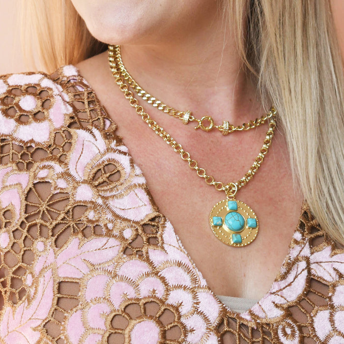 Gold chain necklace with round turquoise stone pendant, boutique wholesale jewelry for women, boho statement accessory, waterproof and hypoallergenic necklace, tarnish-free gold chain, trendy turquoise pendant jewelry for stylish women’s boutiques