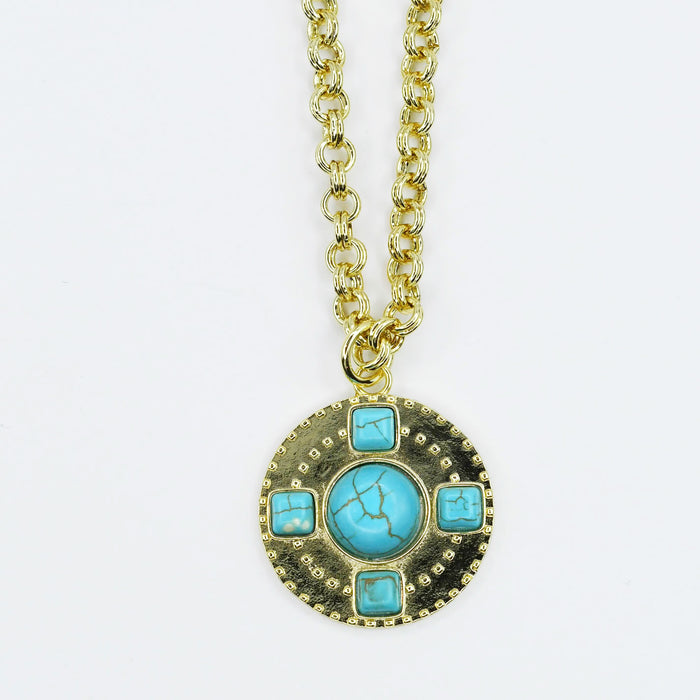 Gold chain necklace with round turquoise stone pendant, boutique wholesale jewelry for women, boho statement accessory, waterproof and hypoallergenic necklace, tarnish-free gold chain, trendy turquoise pendant jewelry for stylish women’s boutiques
