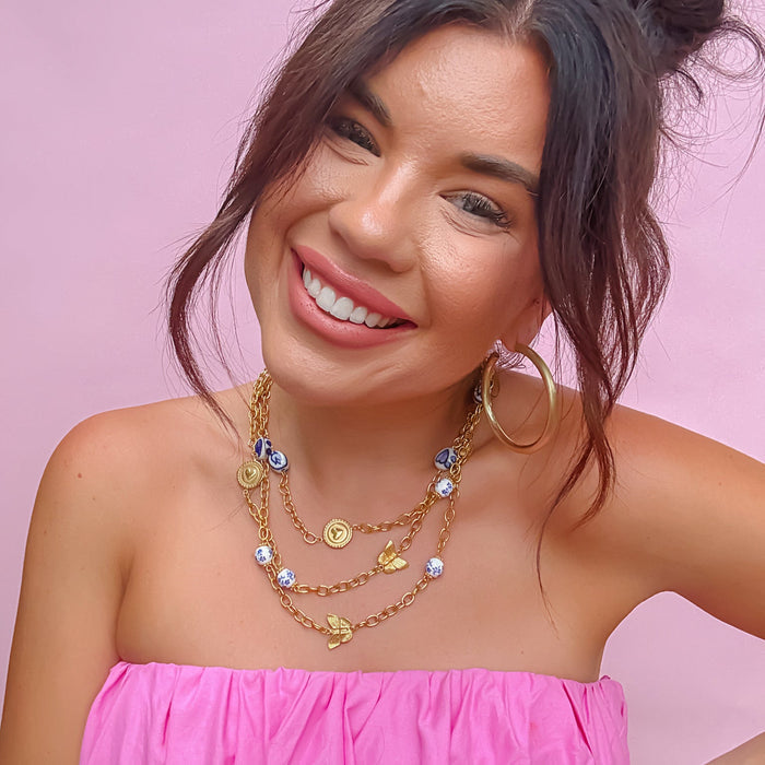 Colorful charms gold necklace featuring gemstone details, layered jewelry design, trendy accessory for women’s jewelry collections, boutique wholesale fashion necklace that is hypoallergenic, tarnish free, and waterproof jewelry with a cute aesthetic statement style