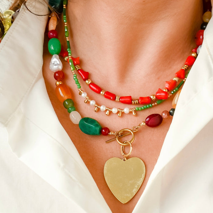 Colorful charms gold necklace featuring gemstone details, layered jewelry design, trendy accessory for women’s jewelry collections, boutique wholesale fashion necklace that is hypoallergenic, tarnish free, and waterproof jewelry with a cute aesthetic statement style