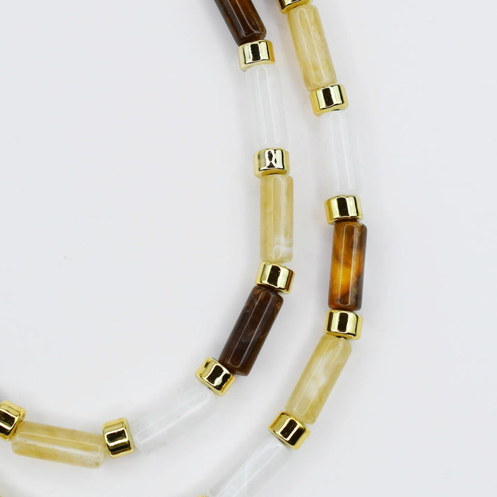 Colorful charms gold necklace featuring gemstone details, layered jewelry design, trendy accessory for women’s jewelry collections, boutique wholesale fashion necklace that is hypoallergenic, tarnish free, and waterproof jewelry with a cute aesthetic statement style