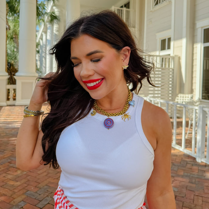 Gold charm necklace, cosmic pendant necklace, colorful evil eye charm, chunky gold chain, ocean-inspired charms, celestial jewelry, trendy statement necklace, boutique wholesale jewelry, waterproof, hypoallergenic, tarnish free