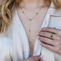 Gold Y necklace with blue teardrop gemstones, trendy statement gold necklace, boutique wholesale jewelry for women, waterproof gold necklace, hypoallergenic and tarnish-free necklace