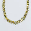 Dainty gold layered necklace, boutique wholesale jewelry, waterproof gold necklace, hypoallergenic and tarnish free statement accessory featuring a gold chain necklace with textured links and a front toggle clasp