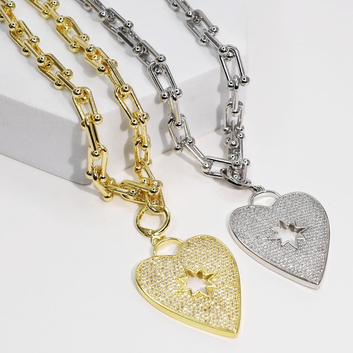 Dainty gold necklace with sparkly heart pendant and star cutout, waterproof tarnish-free hypoallergenic jewelry, trendy statement accessory for women’s boutiques, wholesale jewelry