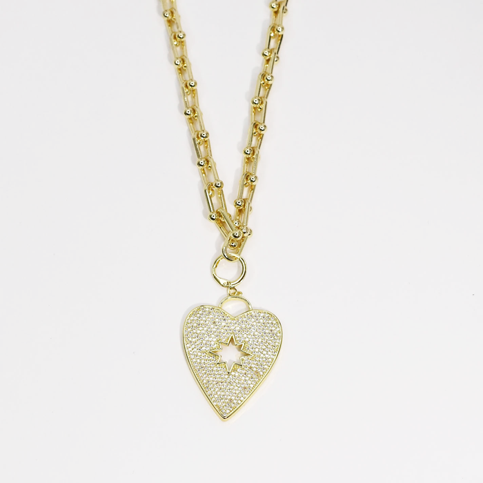 Dainty gold necklace with sparkly heart pendant and star cutout, waterproof tarnish-free hypoallergenic jewelry, trendy statement accessory for women’s boutiques, wholesale jewelry