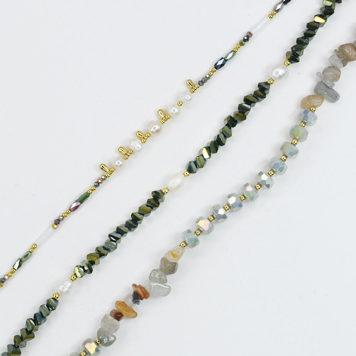 Colorful charms gold necklace featuring gemstone details, layered jewelry design, trendy accessory for women’s jewelry collections, boutique wholesale fashion necklace that is hypoallergenic, tarnish free, and waterproof jewelry with a cute aesthetic statement style