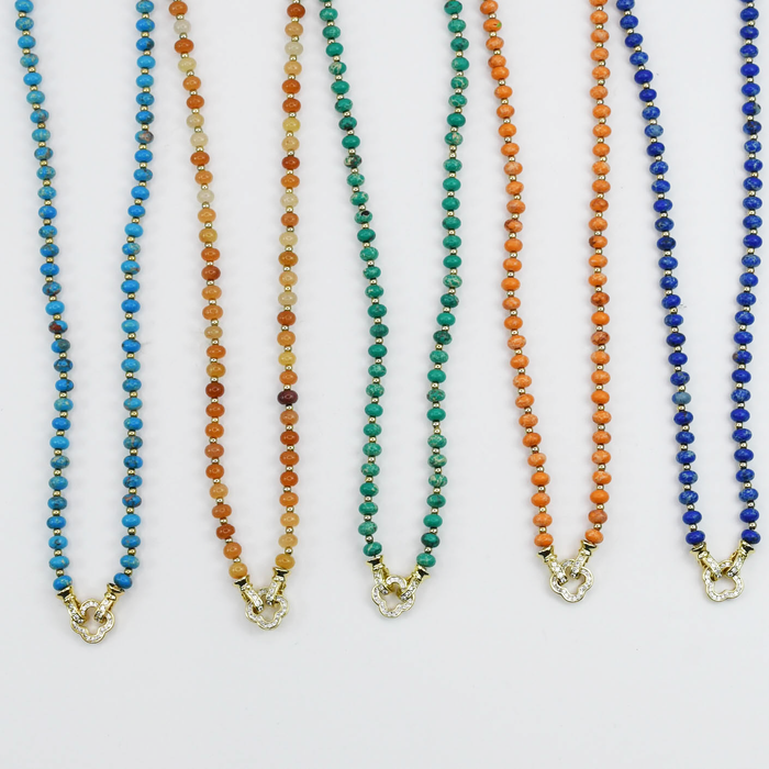 Colorful charms gold necklace featuring gemstone details, layered jewelry design, trendy accessory for women’s jewelry collections, boutique wholesale fashion necklace that is hypoallergenic, tarnish free, and waterproof jewelry with a cute aesthetic statement style