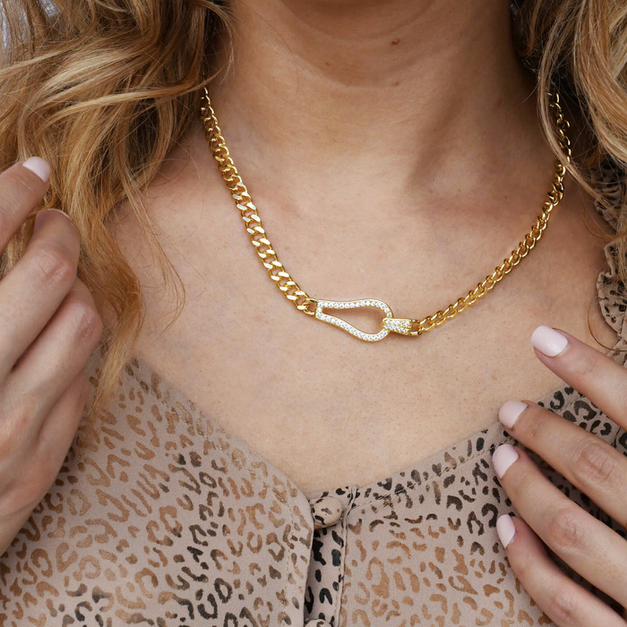 Gold chain necklace with crystal-studded hook-shaped pendant, wholesale jewelry for women's boutiques, trendy gold accessory, boutique wholesale jewelry, waterproof necklace, hypoallergenic jewelry, tarnish-free gold chain, minimalist statement necklace for everyday wear