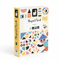 A children's magnetic notebook titled 'Magnét'book' shown at a three-quarter angle on a plain white background. The notebook has a cream-colored grid cover decorated with colorful geometric shapes, a yellow spine, and a cartoon character wearing a blue hat.