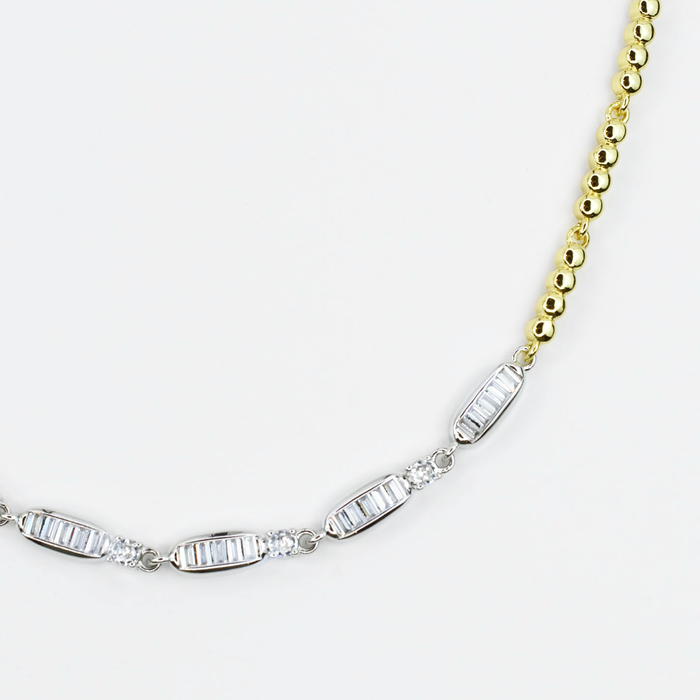 Dainty gold layered necklace, wholesale jewelry for women's boutiques, statement accessory, boutique wholesale jewelry, waterproof necklace, hypoallergenic jewelry, tarnish-free gold necklace, trendy gold jewelry, gold beaded chain necklace with silver baguette crystal accents