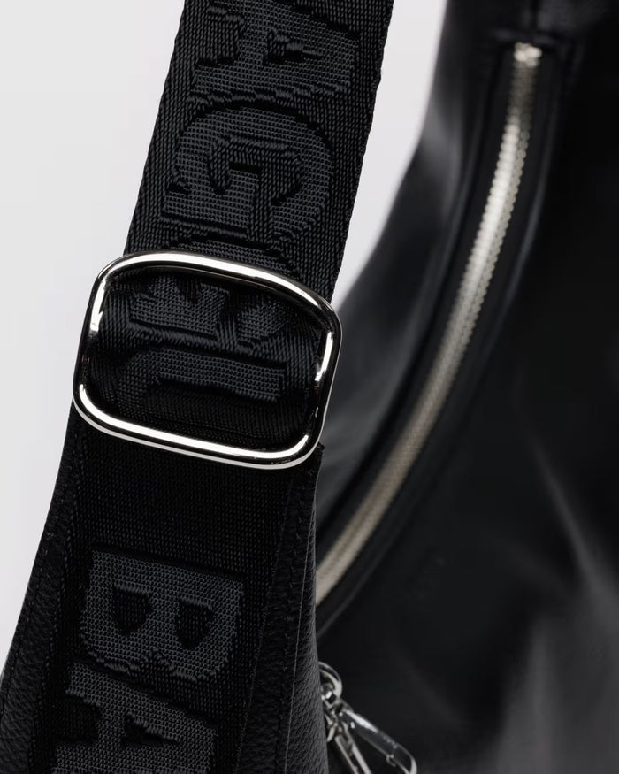 MEDIUM RECYCLED LEATHER CRESCENT BAG, Black — by Baggu