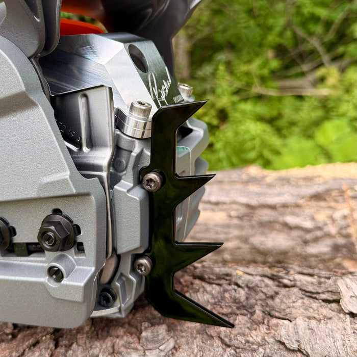 A Ripsaw 4 point felling dog installed on a Husqvarna 550xpg