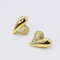 gold plated heart stud earrings, sparkling crystal pavé detailing, hypoallergenic, tarnish-free, wholesale boutique earrings, trendy fashion boutique jewelry, high-quality accessory