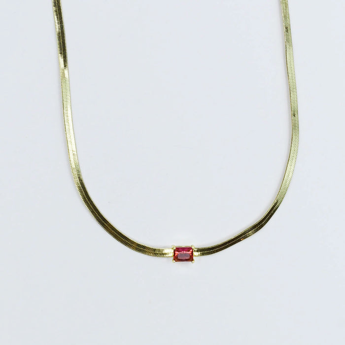 Gold necklace with a ruby square gemstone pendant, boutique wholesale jewelry for women, trendy minimalist accessory, waterproof and hypoallergenic necklace, tarnish-free gold chain, elegant ruby gemstone choker for stylish women’s boutiques