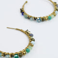 Colorful handcrafted gemstone earrings featuring multicolored beads on 24k gold dainty hoop earrings, waterproof earrings, tarnish free jewelry, hypoallergenic earrings for sensitive skin, gold hoop earrings, boutique wholesale earrings, trendy gold jewelry, high quality jewelry gifts