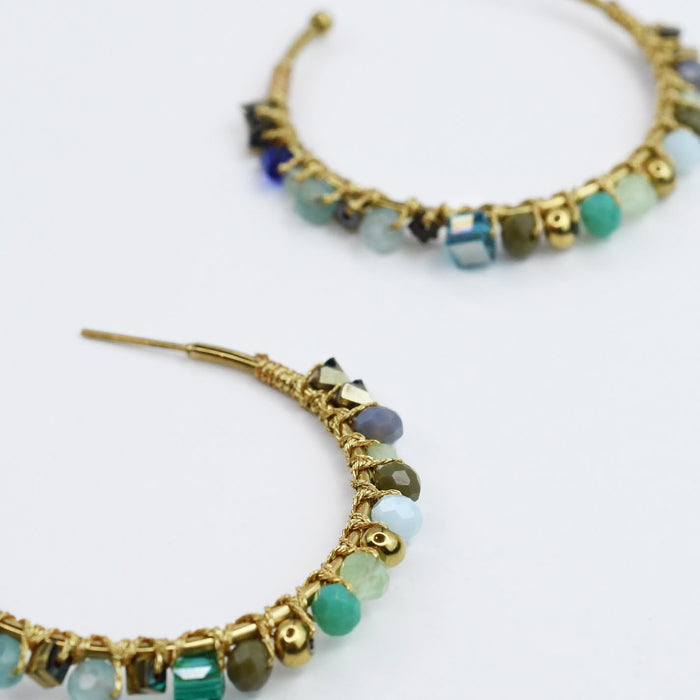 Colorful handcrafted gemstone earrings featuring multicolored beads on 24k gold dainty hoop earrings, waterproof earrings, tarnish free jewelry, hypoallergenic earrings for sensitive skin, gold hoop earrings, boutique wholesale earrings, trendy gold jewelry, high quality jewelry gifts