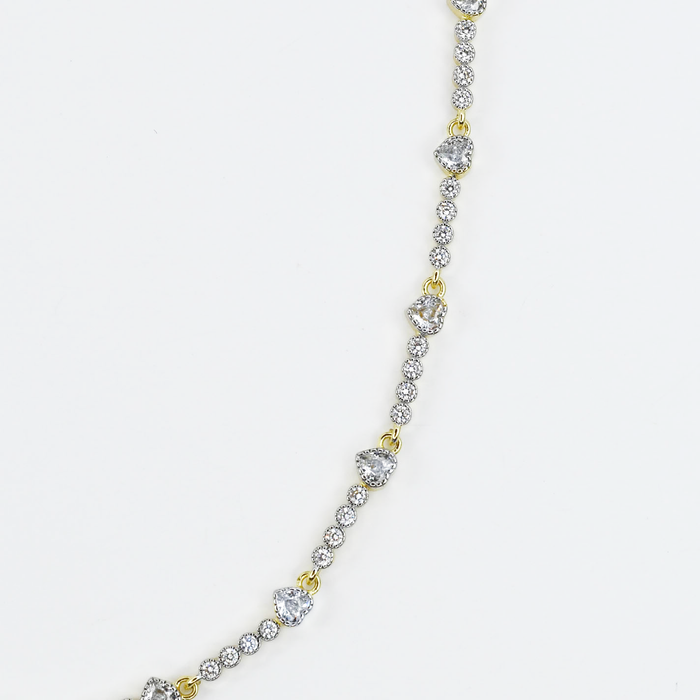 Dainty gold layered necklace, wholesale jewelry for women's boutiques, statement accessory, boutique wholesale jewelry, waterproof necklace, hypoallergenic jewelry, tarnish-free gold necklace, trendy gold jewelry, delicate silver chain necklace with round clear crystal accents