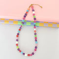 Colorful charms gold necklace featuring gemstone details, layered jewelry design, trendy accessory for women’s jewelry collections, boutique wholesale fashion necklace that is hypoallergenic, tarnish free, and waterproof jewelry with a cute aesthetic statement style