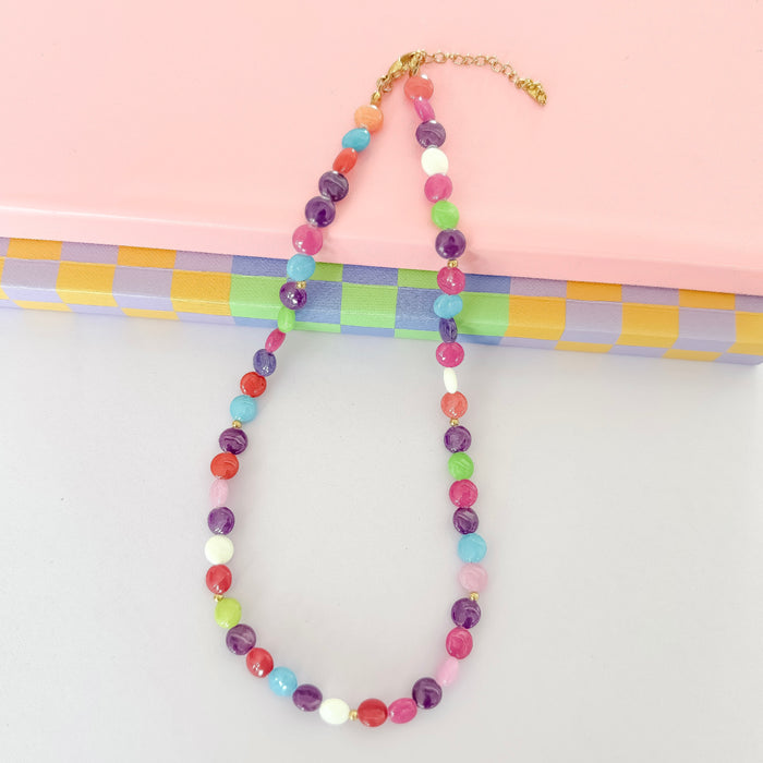 Colorful charms gold necklace featuring gemstone details, layered jewelry design, trendy accessory for women’s jewelry collections, boutique wholesale fashion necklace that is hypoallergenic, tarnish free, and waterproof jewelry with a cute aesthetic statement style