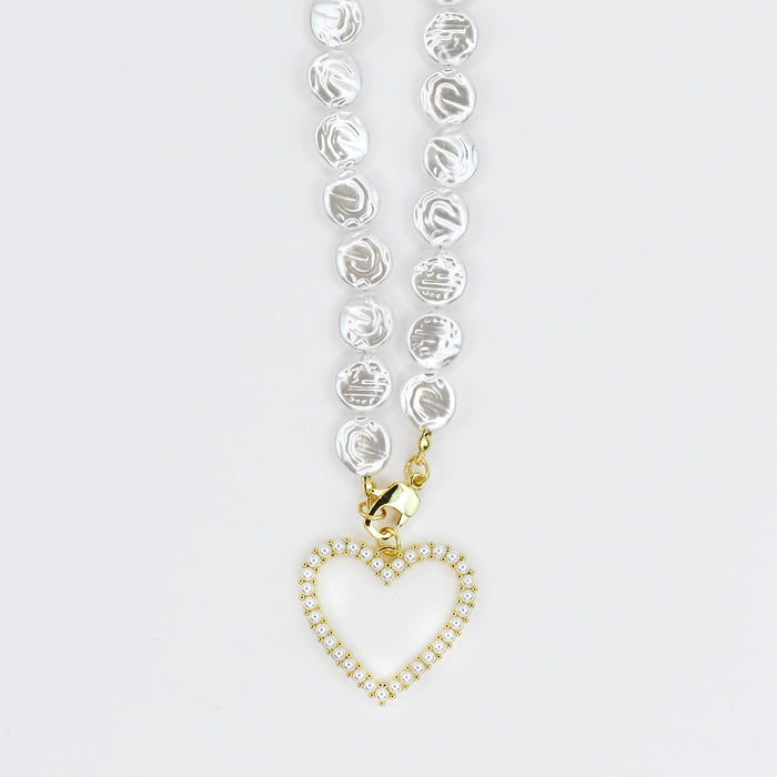 Dainty gold layered necklace heart pendant with pearl details for wholesale jewelry for women's boutiques statement accessory waterproof necklaces boutique wholesale jewelry trendy hypoallergenic tarnish free