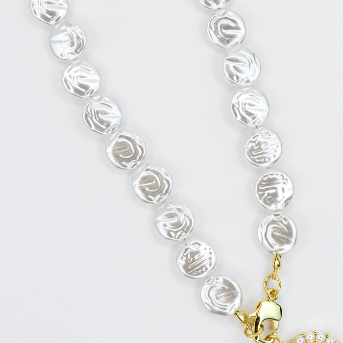 Dainty gold layered necklace heart pendant with pearl details for wholesale jewelry for women's boutiques statement accessory waterproof necklaces boutique wholesale jewelry trendy hypoallergenic tarnish free