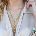 Gold cascade necklace with round turquoise stones, layered drop turquoise jewelry, boho chic statement necklace, boutique wholesale jewelry, waterproof gold necklace, hypoallergenic tarnish-free fashion jewelry for women