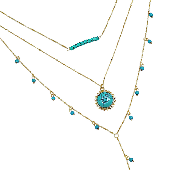 Layered gold turquoise necklace set with beaded accents, boutique wholesale jewelry for women, trendy boho statement accessory, waterproof and hypoallergenic layered necklaces, tarnish-free gold chains, turquoise pendant necklace for stylish women’s boutiques